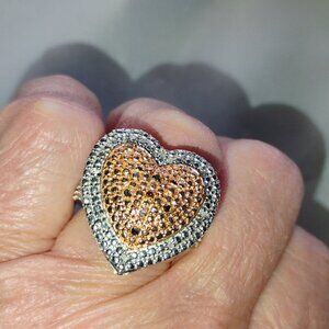 Heart ring with red diamond accents in sterling silver